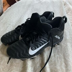 Nike Alpha black cleats, very little to no wear on outside and inside.